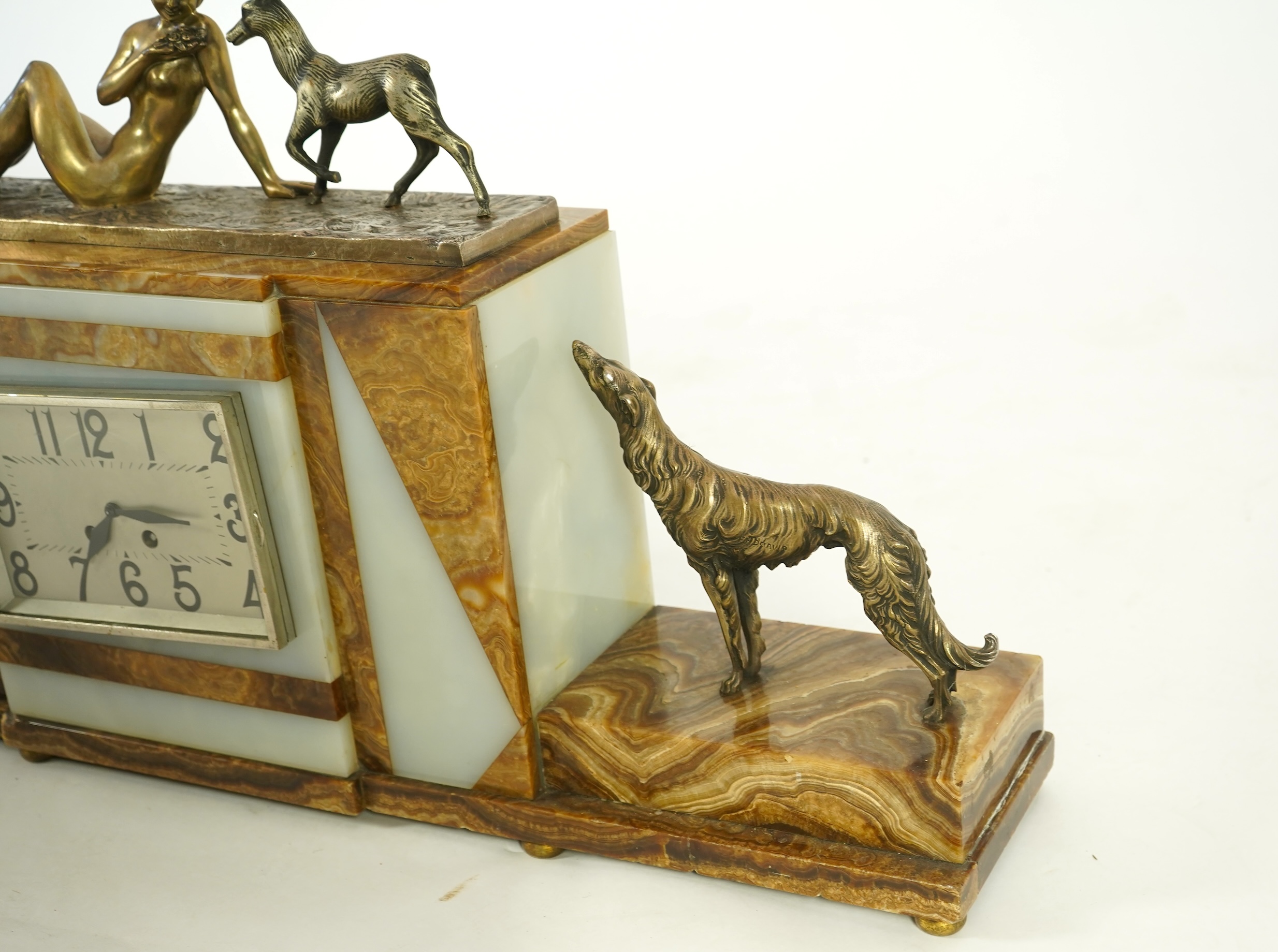 F.H. Danvin (French, 20th century), a marble and onyx clock